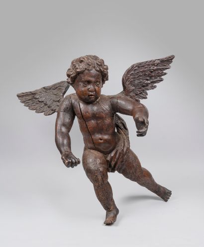 null 
Cupidon, Epreuve en bois sculpté.

XVIIè siècle.

Haut.: 67 cm. ; Larg.: 72 cm....