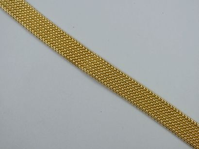 null Bracelet en or jaune 18k à maille tressée souple agrémentée de motifs d'étoiles...