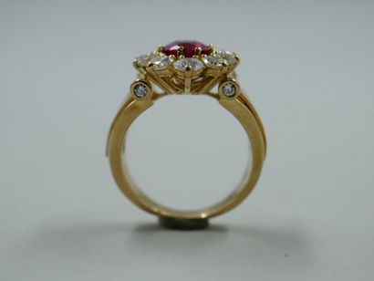 null KORLOFF. 

Ring in 18k yellow gold and red lacquered enamel decorated with a...