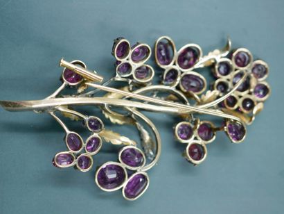 null Brooch of flower in yellow gold 18k and silver set with tourmalines and decorated...