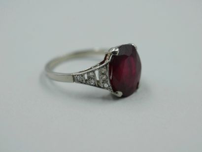 null White gold ring with an oval ruby of about 3cts probably treated with rose-cut...