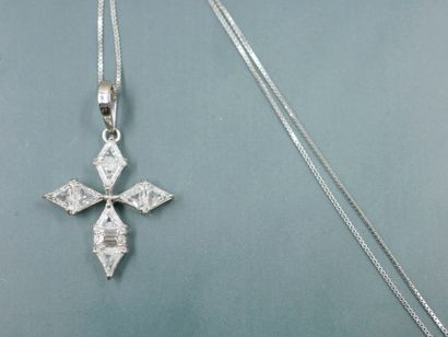 null Cross pendant in 18k white gold set with triangular and princess cut diamonds....