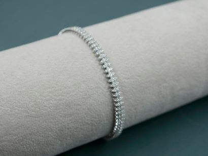 null Line bracelet in 18k white gold composed of navette motifs each set with three...