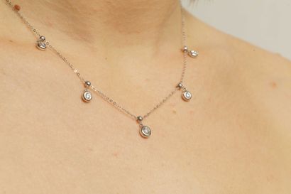 null Necklace Pampilles in 18k white gold set with five diamonds. 

PB : 2,75gr -...