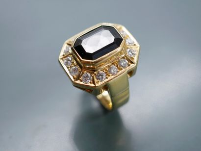 null 18k yellow gold ring with octagonal bezel set with a sapphire of about 3.50cts...