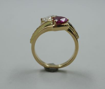 null An 18k yellow gold you and me ring topped with a 0.85ct pink BURMA sapphire...