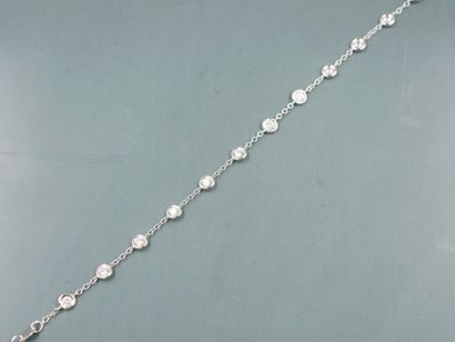 null Bracelet in 18k white gold punctuated with 12 diamonds for 0.90cts approximately....