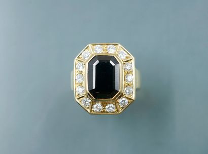 null 18k yellow gold ring with octagonal bezel set with a sapphire of about 3.50cts...