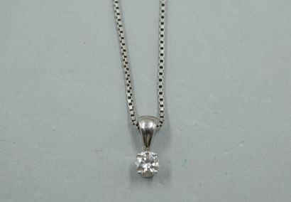 null 18k white gold pendant set with a diamond of 0.25cts approximately. 

With a...