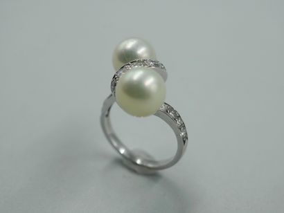 null You and me ring in 18k white gold with two cultured pearls, the setting highlighted...