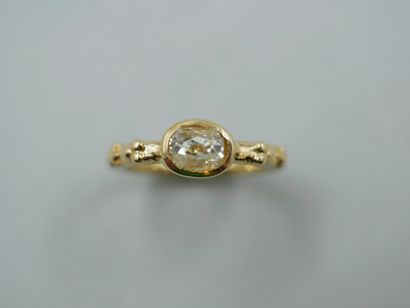 null Ring in the taste of the antique in yellow gold 18k set with a diamond of old...