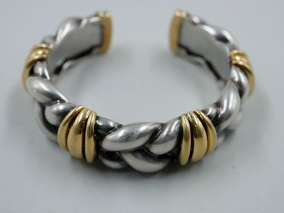 null OJ PERRIN.

Bracelet in silver and 18k gold.

Signed and numbered. 

Weight...