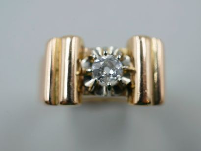 null Tank ring in 18k yellow gold with a 0.30ct diamond in the center. 

Work of...