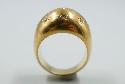 null Dome ring in 18k yellow gold studded with diamonds in a star pattern. 

Work...