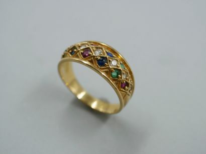 null Band ring in 18k yellow gold with diamonds, sapphires and rubies. 

PB : 6,60gr....