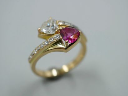 null An 18k yellow gold you and me ring topped with a 0.85ct pink BURMA sapphire...