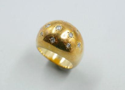 null Dome ring in 18k yellow gold studded with diamonds in a star pattern. 

Work...