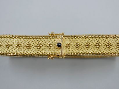 null Bracelet en or jaune 18k à maille tressée souple agrémentée de motifs d'étoiles...