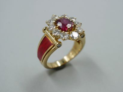 null KORLOFF. 

Ring in 18k yellow gold and red lacquered enamel decorated with a...
