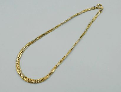 Necklace in 18k yellow gold, the clasp surrounded...