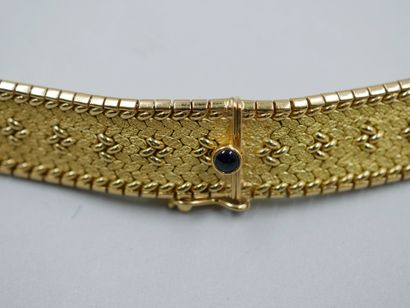 null Necklace in 18k yellow gold braided with flexible mesh and punctuated with stars....