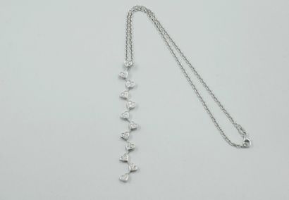 null Necklace in 18k white gold adorned with a pendant drop of hearts paved with...