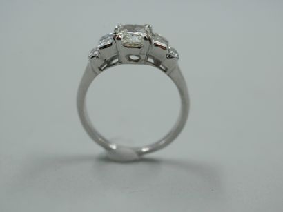 null 18k white gold pinky ring with a 1.00 ct cushion-cut diamond surrounded by two...