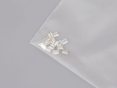 null Sixteen baguette-cut diamonds on paper for a total of about 1.50cts. 

(Acc...