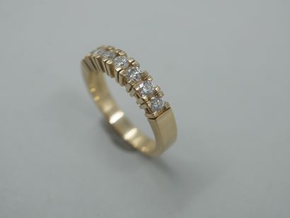 null Half wedding ring in 14k yellow gold set with seven brilliant-cut diamonds.

PB...