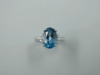 null Ring in 18k white gold topped with an oval zircon of about 4 cts. The setting...