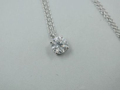 null Necklace in 18k white gold with a 1ct diamond of F color and SI2 clarity. 

Length...