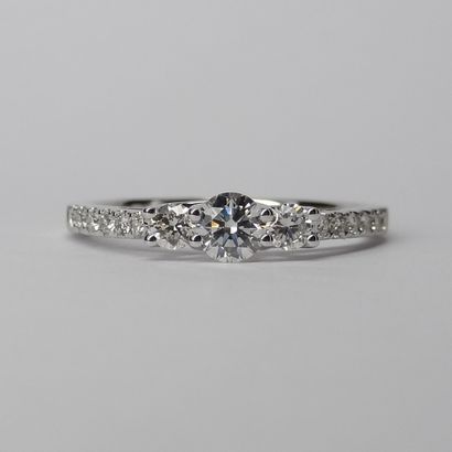 null Trilogy ring in 18k white gold topped with three diamonds in a brilliant setting....