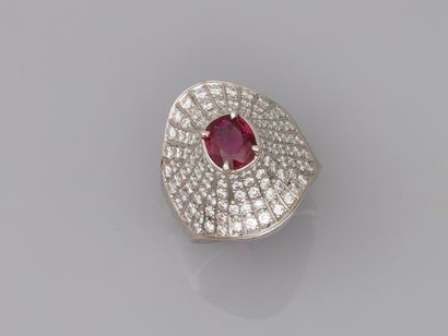 null 
18k brushed platinum ring centered with an oval ruby of about 1.50cts in a...