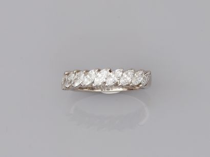 null Half wedding ring in 18k white gold set with marquise-cut diamonds for about...