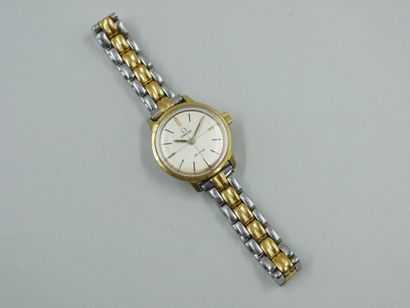 null OMEGA, City model. 

Steel and gold-plated lady's wristwatch. Dial with index...