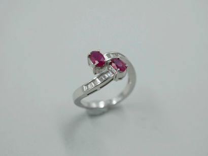 null A Vous Moi ring in 18k white gold with two oval rubies set with lines of navette-cut...