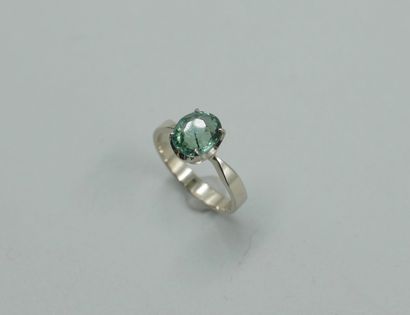 null Ring in rhodium-plated 18k white gold with a green paraiba tourmaline of about...
