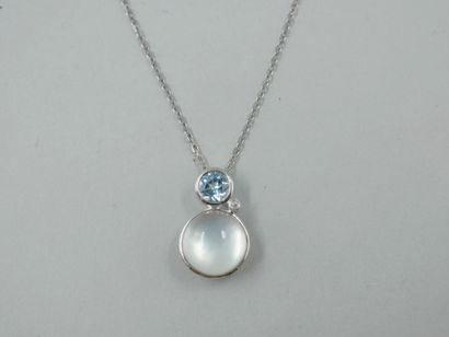 null 18k white gold pendant set with a mother-of-pearl under crystal cabochon topped...