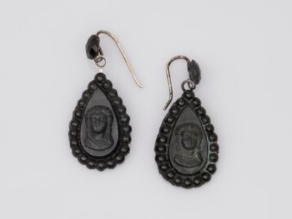 null Pair of drop-shaped earrings adorned with a cameo portrait of a woman in imitation...