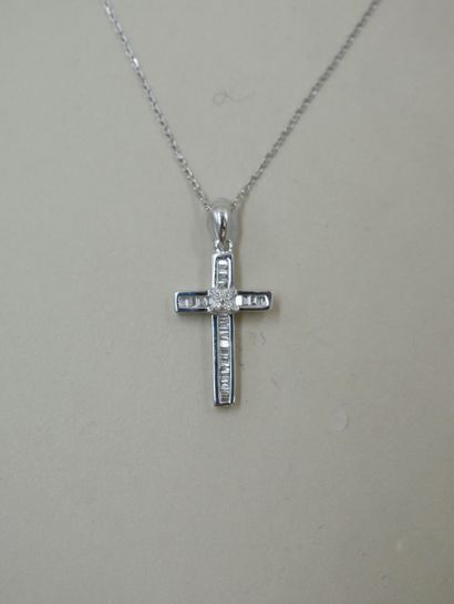 null Cross pendant in 18k white gold paved with baguette-cut diamonds and set in...