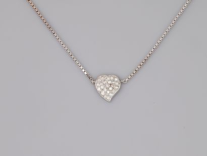 null Necklace in 18k white gold decorated with a heart paved with diamonds. 

Length...