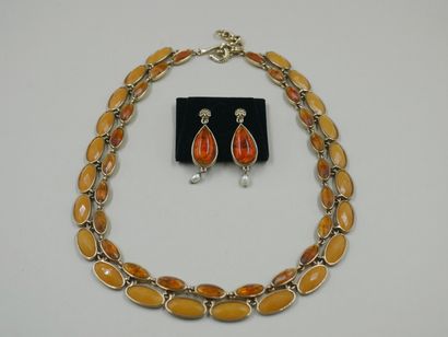 null MONET. 

Set including a necklace two rows of gold metal decorated with imitation...