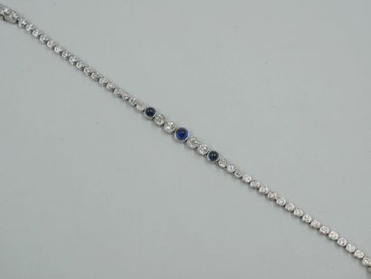 null 
Soft bracelet in platinum and 18k white gold decorated with three cabochons...