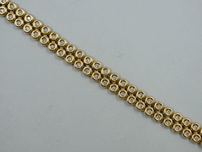 null Bracelet Zigzag en or jaune 18k orné de diamants en serti clos. 

PB : 19,9...
