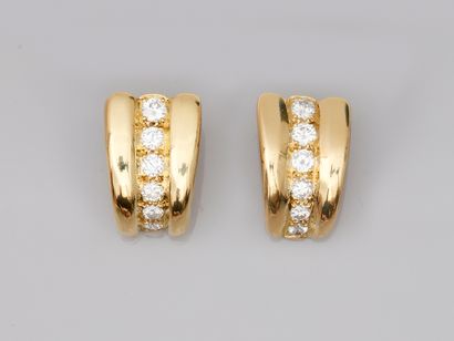 null Pair of 18k yellow gold earrings set with a line of diamonds for 1.20cts approximately.

Length...