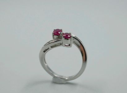null A Vous Moi ring in 18k white gold with two oval rubies set with lines of navette-cut...