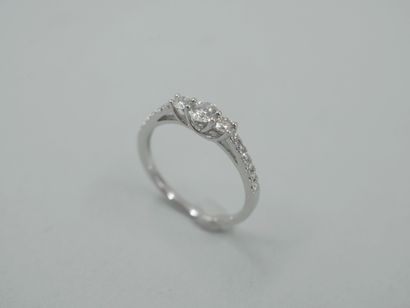 null Trilogy ring in 18k white gold topped with three diamonds in a brilliant setting....