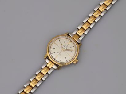 null OMEGA, City model. 

Steel and gold-plated lady's wristwatch. Dial with index...