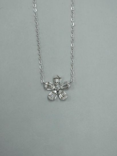 null Flower necklace in 18k white gold holding a flower set with brilliant-cut and...
