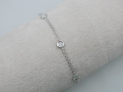 null Bracelet in 18k white gold with five diamonds in closed setting for 0.50cts...